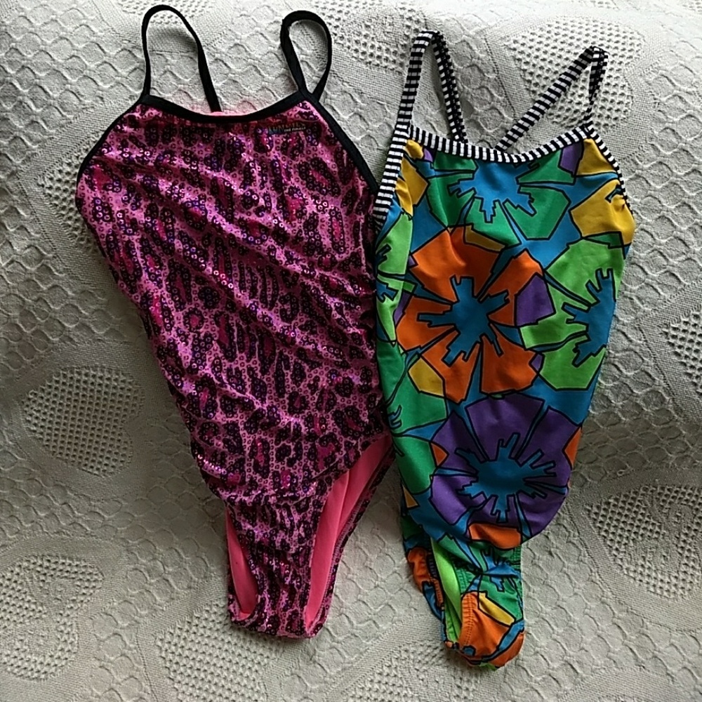 Swim suits (three)